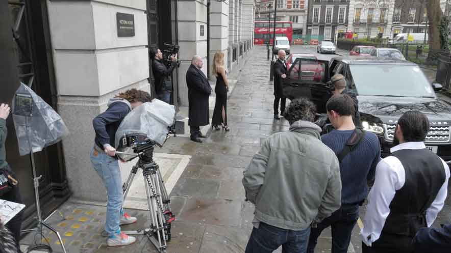 Working as a freelance Data Wrangler. Two cameras and crew filming outside Bloomsbury Ballroom as a Range Rover arrives