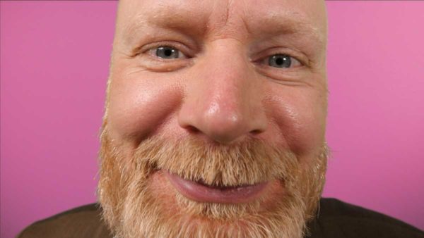 Social media marketing John Pendals' face with a pink background
