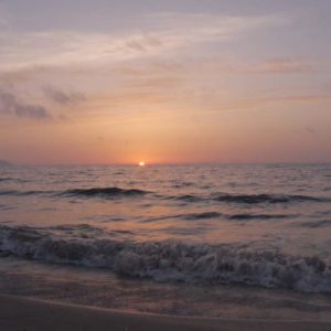 Dawn breaks over sea