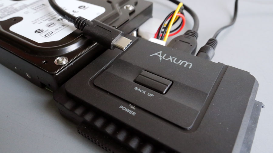 Alxum converter connected to a 3.5" IDE drive ready to connect to a computer