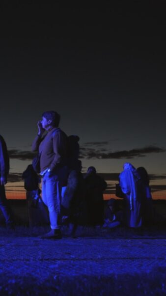 Stonehenge 2026 solstice dawn approaches showing timelapse of people moving with dawn breaking in the distance.