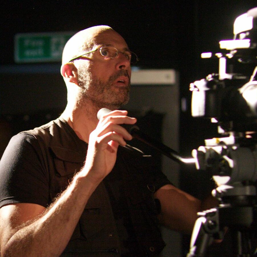 Julian-Langham-filming-in-a-lit-studio