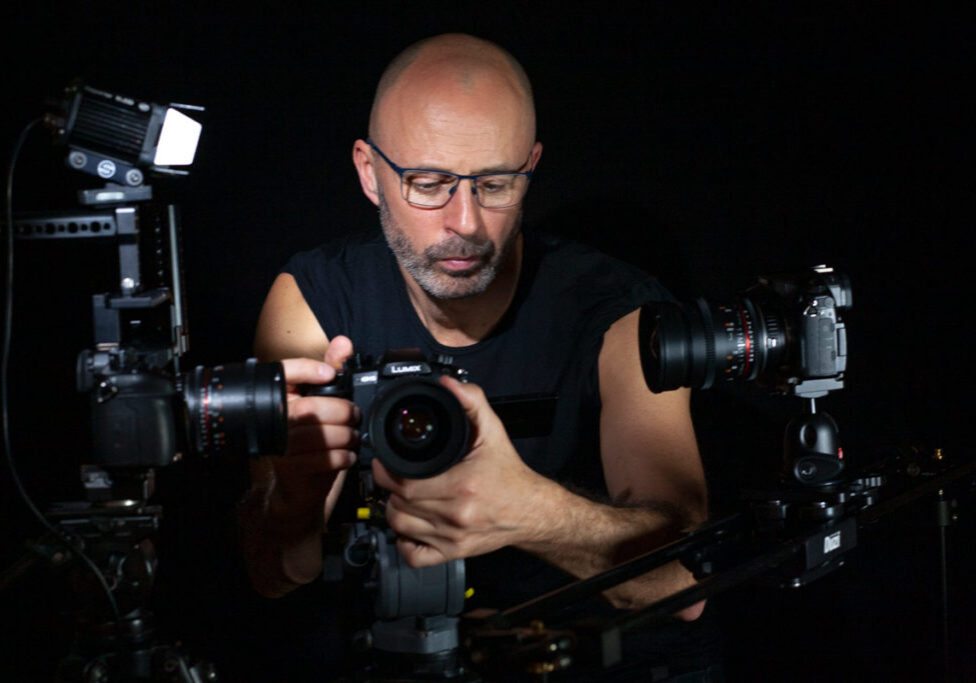 Freelance cameraman with three DSLR cameras