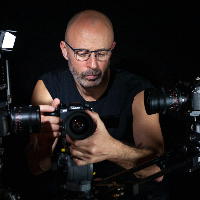 Freelance cameraman with three DSLR cameras